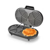 Saachi Double Waffle Maker NL-WM-1551-BK making mini heart-shaped waffles, part of Saachi's UAE waffle maker range